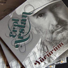 <cite>Yürürüm</cite> – Erol Arslan