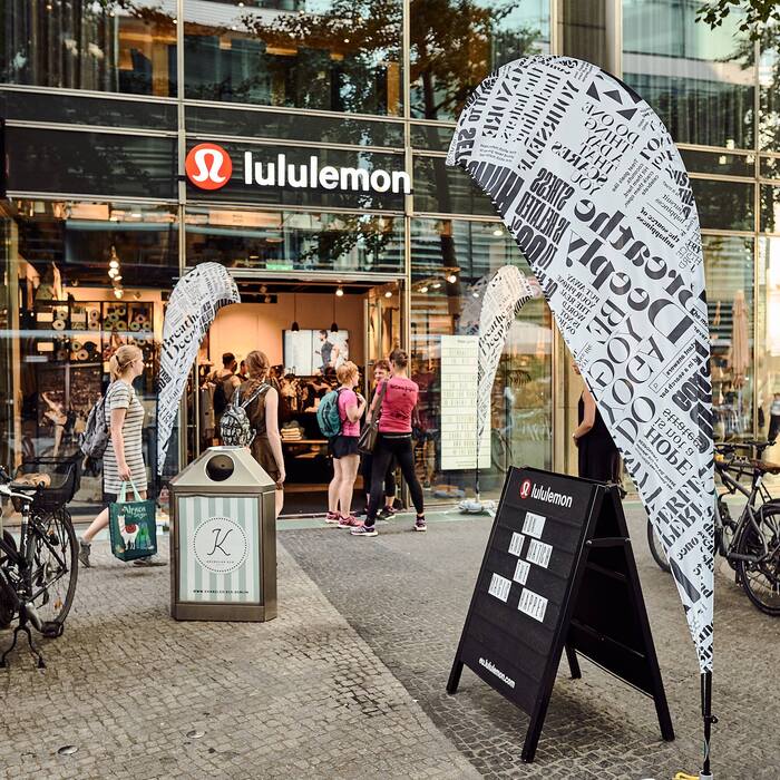 A manifesto flag in front of Berlin’s lululemon shop