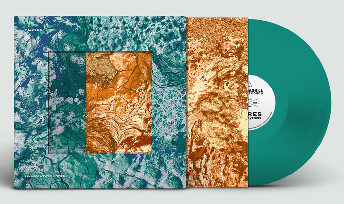 LP with sleeve and record partially removed, revealing the printed inner.