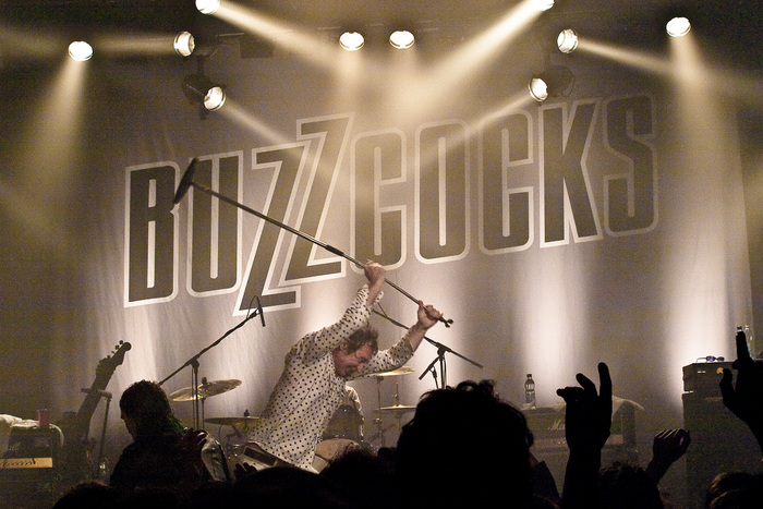 An outlined version of the logo, used as stage decoration at a Buzzcocks concert in 2010.