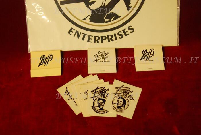The stickers used in the movie. The photo is watermarked “BTTF MUSEUM” (in ), as it is from the Back to the Future Museum in Italy, which had acquired it from ScreenUsed.com. The matchbooks with the simpler logo, which use no identifiable type, are much more prominent in the movie.