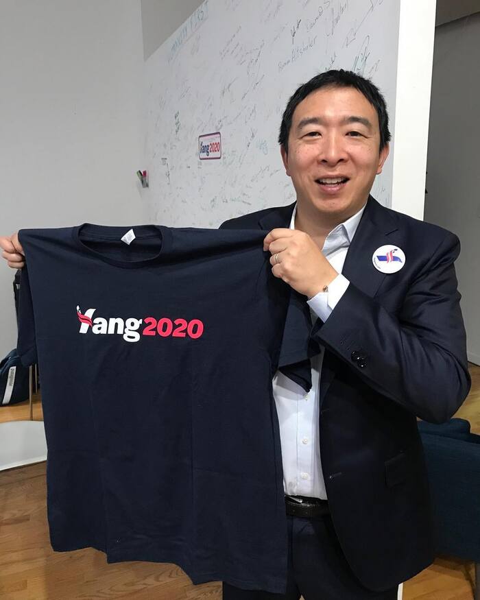 Yang with a campaign T-shirt.