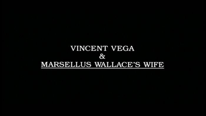 Intertitle card, partially underlined: “Vincent Vega &amp; Marsellus Wallace’s Wife”