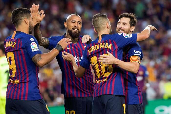 2 February 2019. FC Bacelona’s Lionel Messi gets a hug after scoring one of his two goals against CF Valencia. Shirt numbers with mesh effect, paired with names set in solid letters.