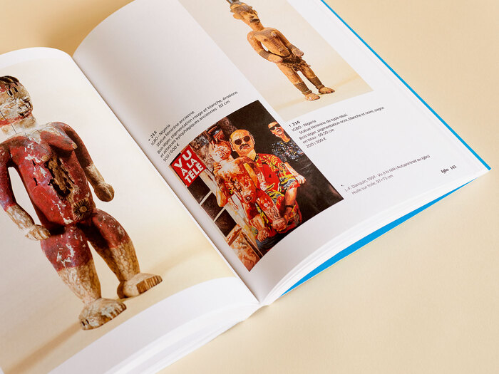 Danquin was a painter. Here’s a self portrait of him showing the Igbo statue shown on the left page. There’s several of his paintings in the book.
