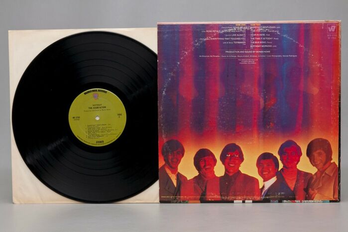 The back cover photograph was shot by George Rodriguez in Los Angeles, Westlake Park area (studio).
