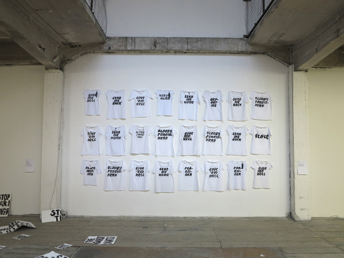 Nada Prlja —Strike. Installation, 2013. 24 hand painted T-shirts. Image from the solo exhibition at FUTURA Center for Contemporary Art, Praha. Courtesy of the artist.