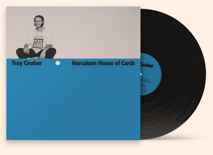 The vinyl sticker and back cover feature some outlined Kabel Black.