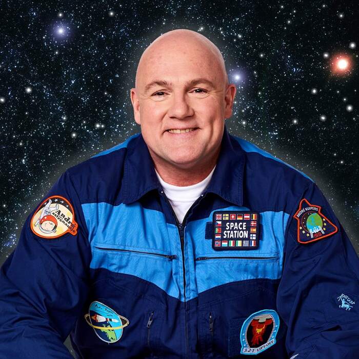 Andr&eacute; Kuipers with a &ldquo;little astronaut&rdquo; patch on his right arm.