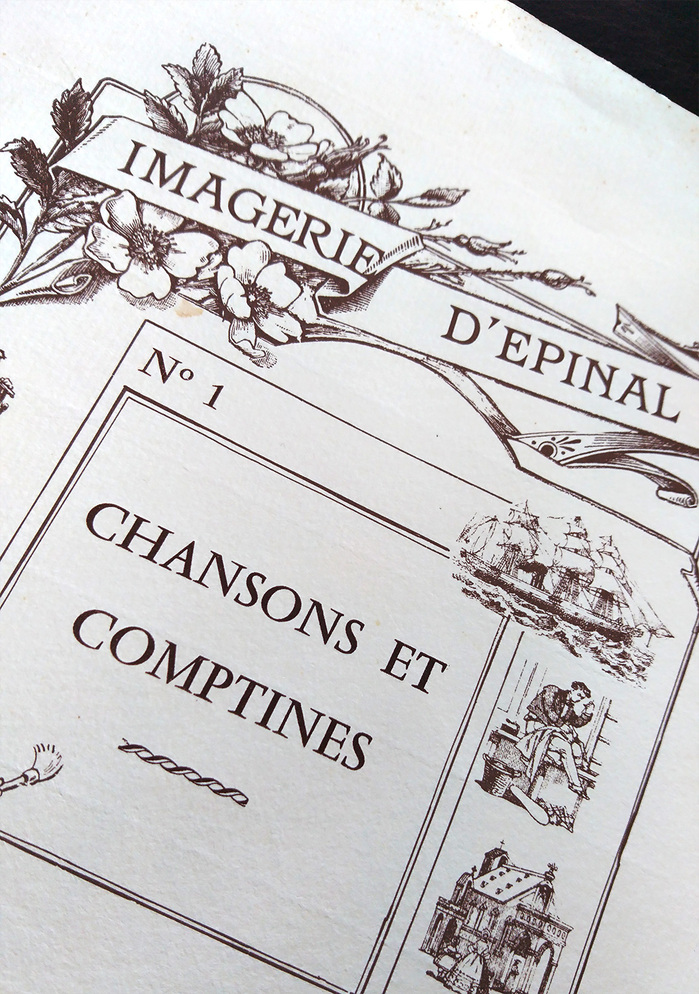 Close-up of the sleeve. ITC Barcelona is used for the label and Vendôme for the title.