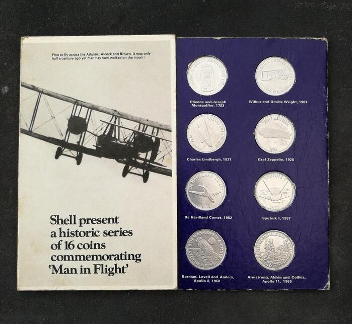 The UK album shows British aviation pioneers John Alcock and Arthur Brown on the back.