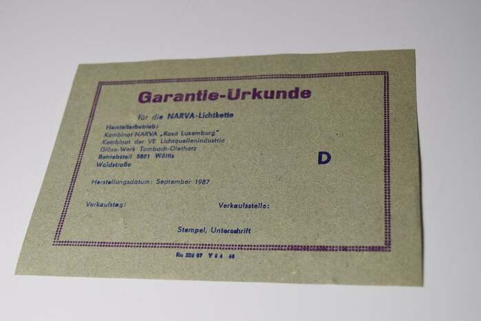 Like many items printed in the GDR, the enclosed certificate of guarantee looks like it is from the 1950s, or even older. In fact, it is letterpress-printed, but wasn’t issued any earlier than 1987. The fonts in use are a version of  fett (first cast in 1909, also carried by Schriftguss in Dresden as Neptun, and later listed under the generic name Grotesk in an early Typoart specimen) and  (1930).