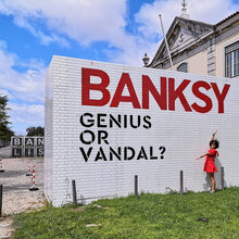 <cite>Banksy: Genius or Vandal?</cite>