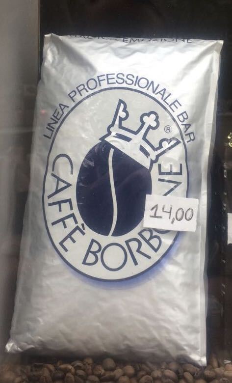 Lithos set on a circle around a crowned coffee bean. The secondary typeface on this package is .