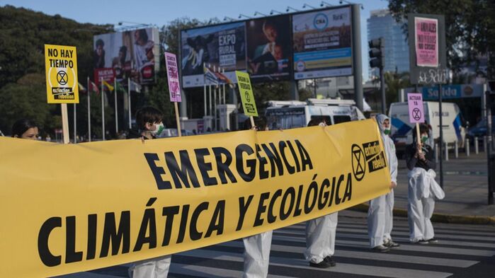 Members of Extinction Rebellion demonstrate at the La Rural exhibition centre in Buenos Aires.
