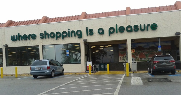 Not too sure of this font (if it is one). The g and i don’t match characters from Blippo Bold. “Where shopping is a pleasure” has been Publix’s slogan off and on for over 60 years. It was coined by Bill Schroter, Director of Advertising, in 1954.
